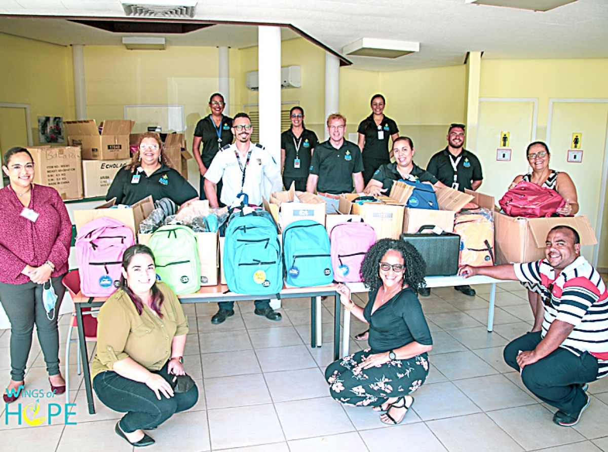 Aeropuerto ta sigui contribui na e comunidad di Aruba por medio di Wings of Hope