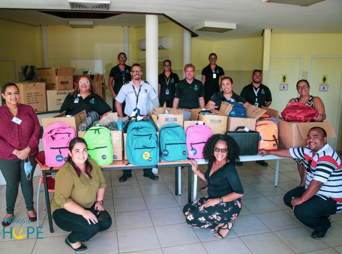 Aeropuerto ta sigui contribui na e comunidad di Aruba por medio di Wings of Hope