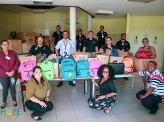 Aeropuerto ta sigui contribui na e comunidad di Aruba por medio di Wings of Hope