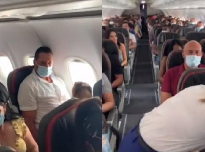 Pasaheronan a colecta placa pa evita cu ta saca un baby di un vuelo