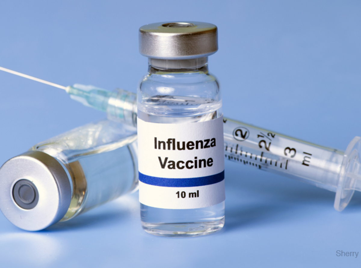 Departamento di Salud Publico a ricibi vacuna di Influenza