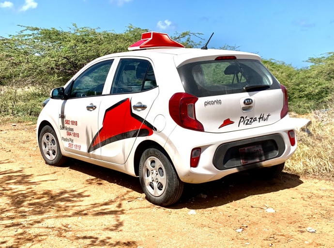 Atraco violento riba trahador di Pizza Hut