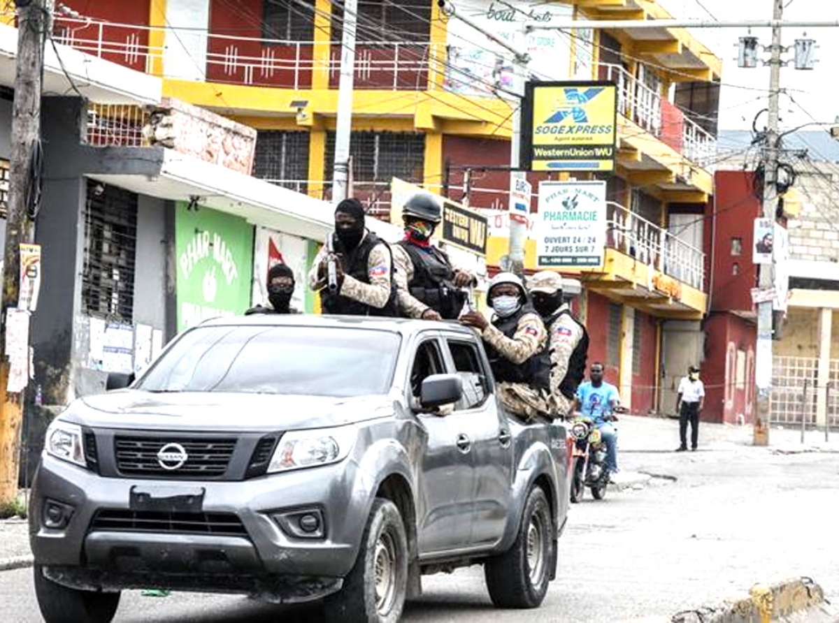 Polis di Haiti indicando cu nan tin prueba cu e rehennan Mericano y Canades ainda ta bibo
