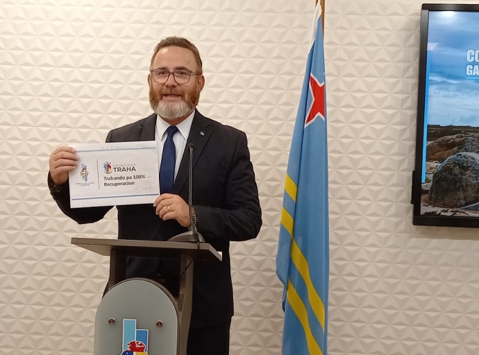 Minister Glenbert Croes a anuncia e programa “Aruba Kier Traha” pa e grupo di FASE