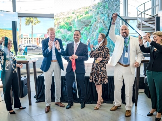 Minister Dangui Oduber contento cu Frontier Airlines a cuminza bula pa Aruba