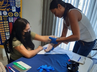 A clausura exitosamente curso di Prome Asistencia/CPR & Siguridad den y rond di cas