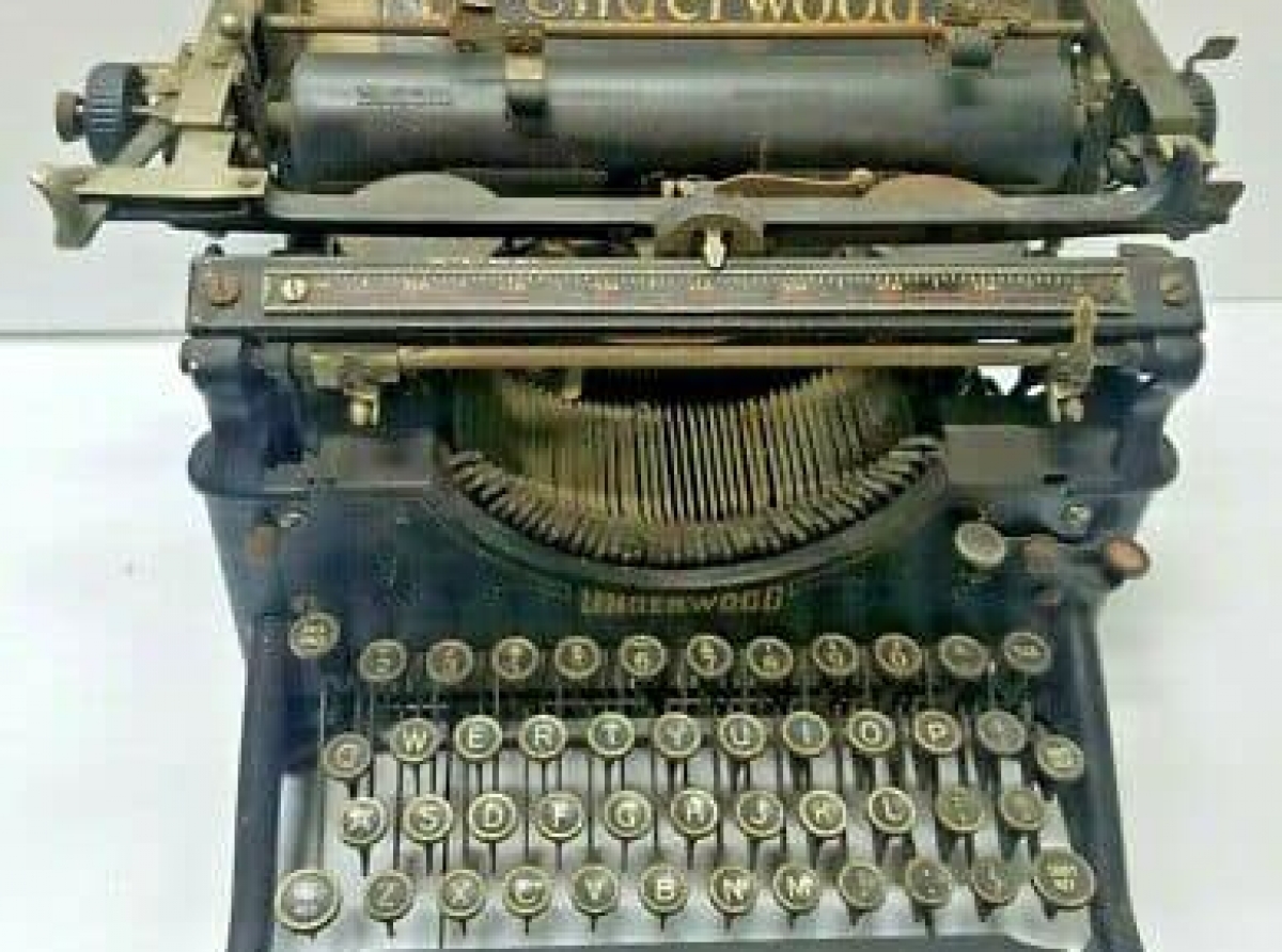 E prome ” typewriter” na Aruba