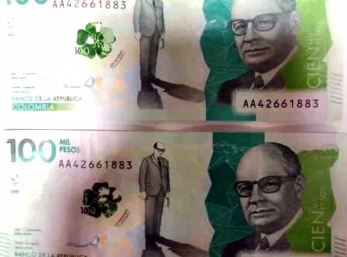Parce tin papel falso di 100 mil Pesos Colombiano den circulacion