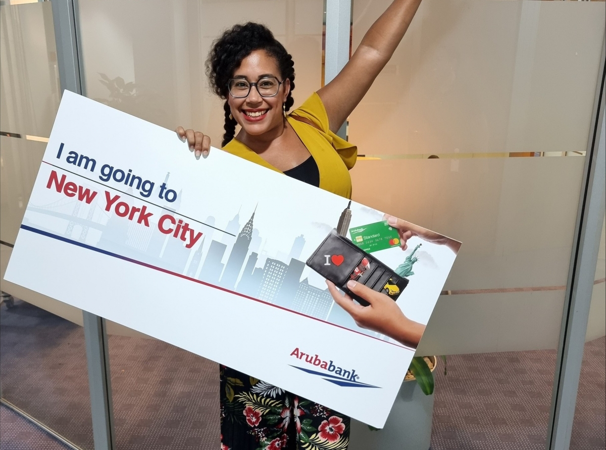 Adamaris Asanio a gana e viahe di Aruba Bank pa bay bishita New York