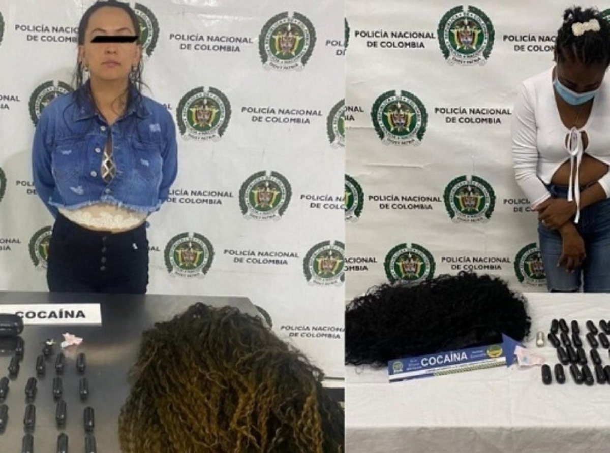 Dos muher Colombiano a purba viaha pa Spaña cu cocaina bon scondi den hair extensions