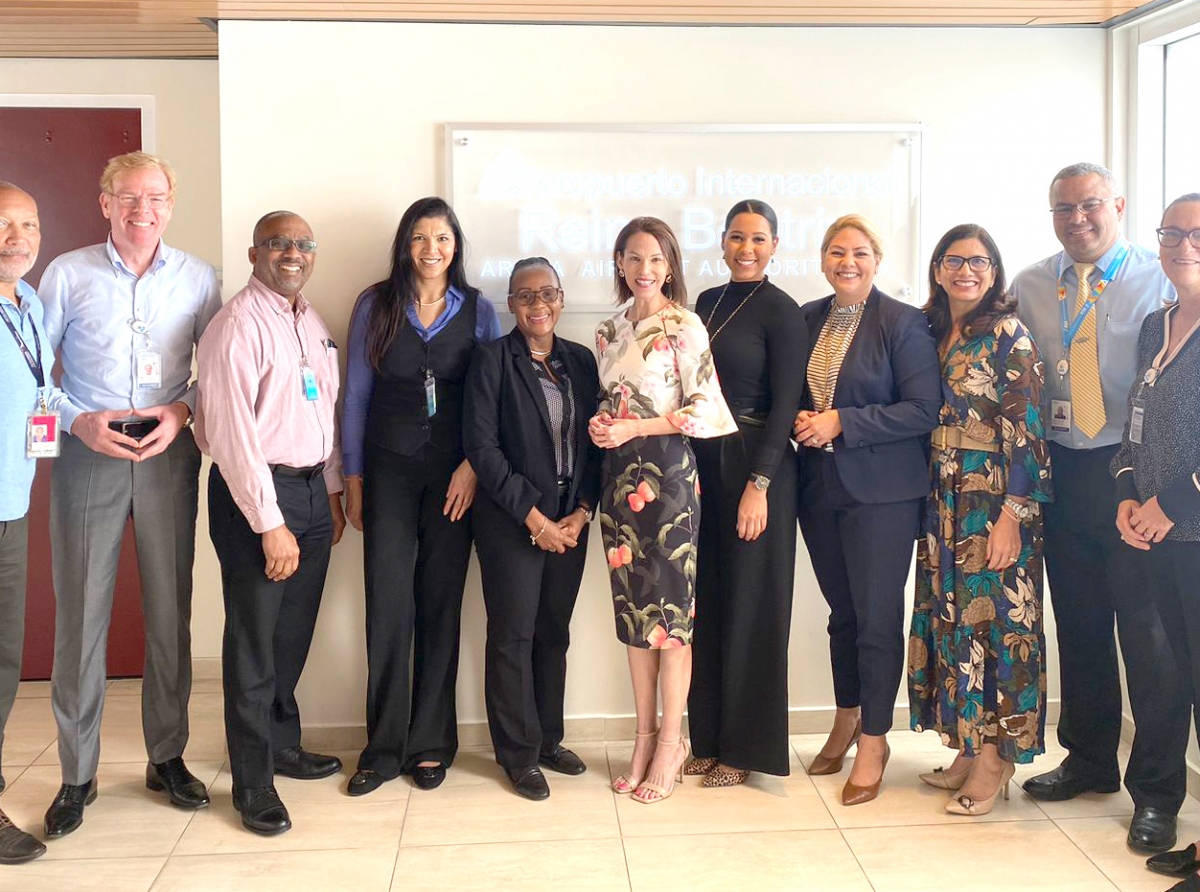 Representantenan di British Airways a bishita Aruba Airport Authority N.V.