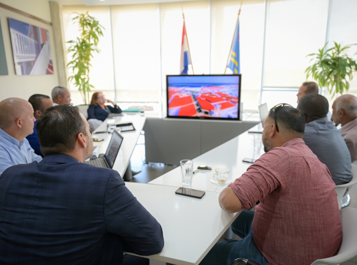 Minister Geoffrey Wever a presenta plan di revitalisacion di San Nicolas na grupo di stakeholders