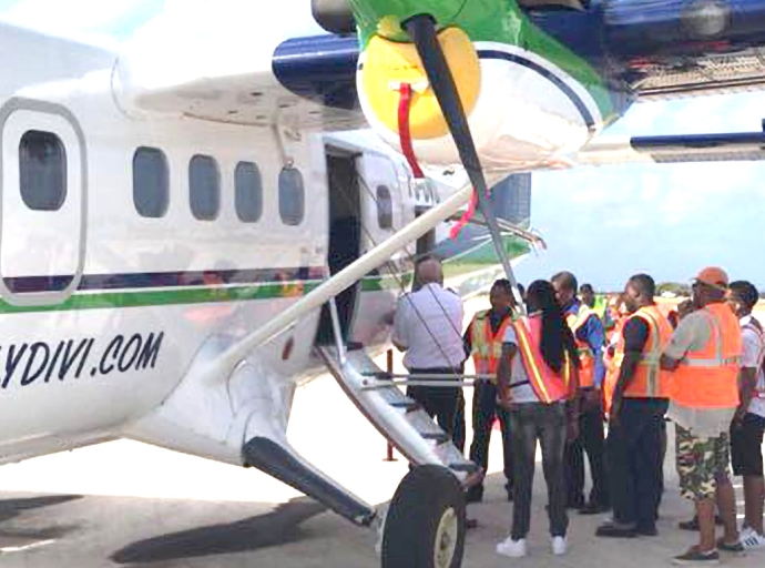 Famia ta insisti cu ningun pasahero a habri e porta di avion Divi Divi Air