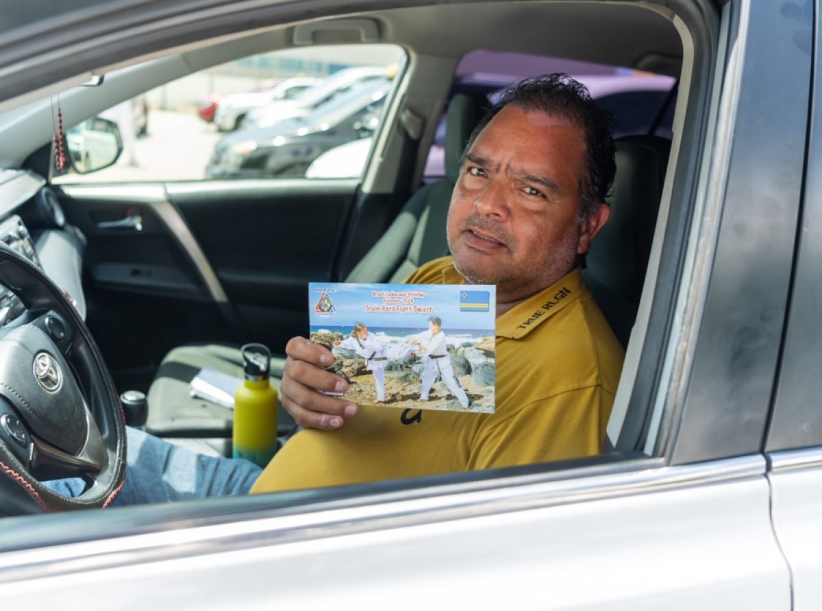 Taxistanan tambe apoyando Calender di Brazil Taekwondo Stichting