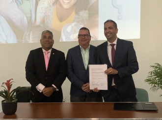 Cuido Salud Hubenil y Wit Gele Kruis a firma convenio pa cu intercambio di informacion riba desaroyo y salud di muchanan