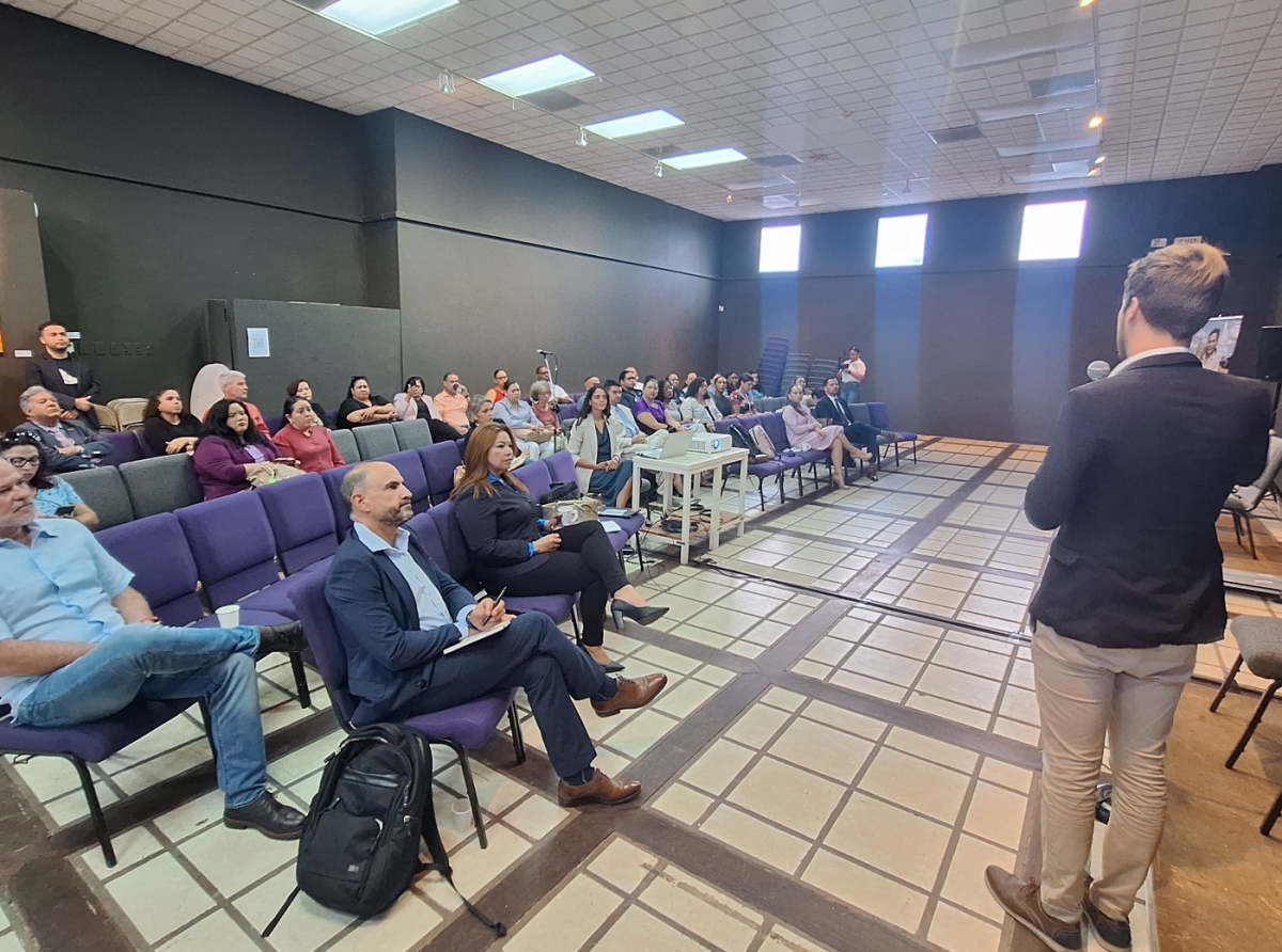 Estudio di IOM Aruba mustrando resultado riba impacto economico di e migracion venezolano na Aruba