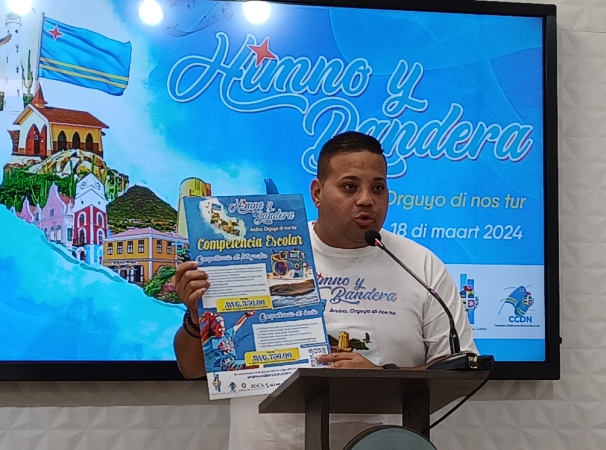 Competencia escolar di fotografia di partinan di Aruba cu ta haci e muchanan orguyoso