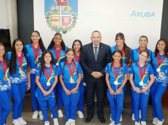 Ministro cu delegacion di landamento artistico cu a representa Aruba na Carifta, Pan Am Champs y Junior World