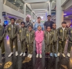Secretaria General di COA a topa cu atletanan di Taekwondo Team Aruba na Aeropuerto di Miami