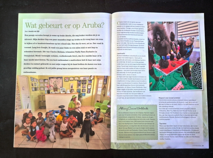 Master Groomer Clarice Holman a haci su debut den un revista renombra na Europa