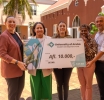 SETAR cu donacion na e Student Development Fund di Universidad di Aruba