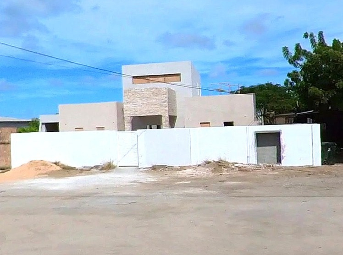 Razzia na varios cas y detencion den investigacion di fraude grandi