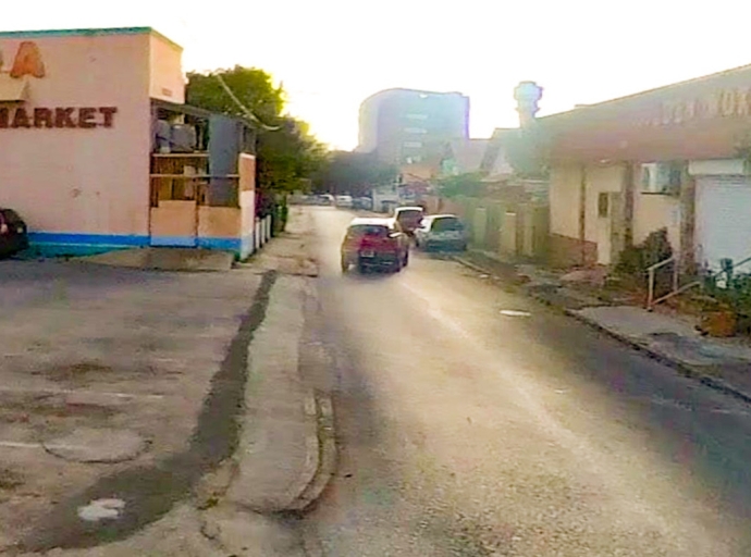 Tiramento den Koningstraat a laga un homber Colombiano herida