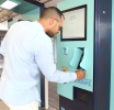 Aeropuerto di Bonaire cu kiosco self service y tambe Smart E-Gates