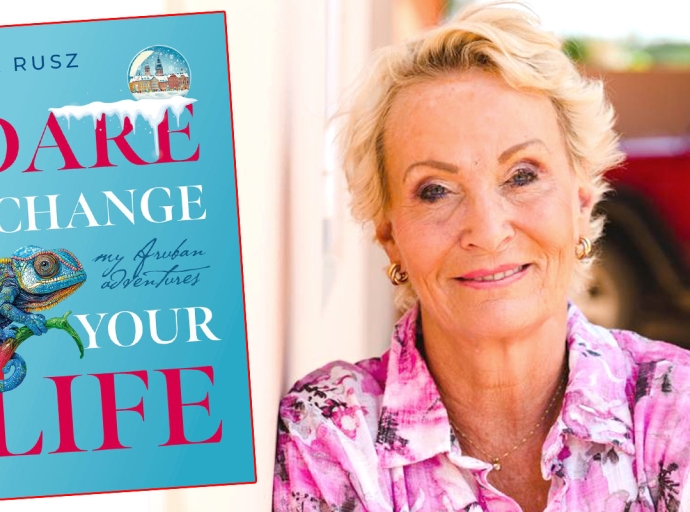 Autora Eva Rusz cu buki pa mustra cierto contratiempo cu el a topa pa bin biba na Aruba