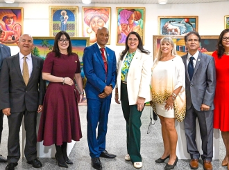 Ministro Mervin Wyatt-Ras ta uni cu comunidad haitiano den celebracion di e 223 aniversario di Bandera di Haiti