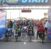 Grandi y chikito a move hunto durante di dos dia di Aruba Bank Walk & Run
