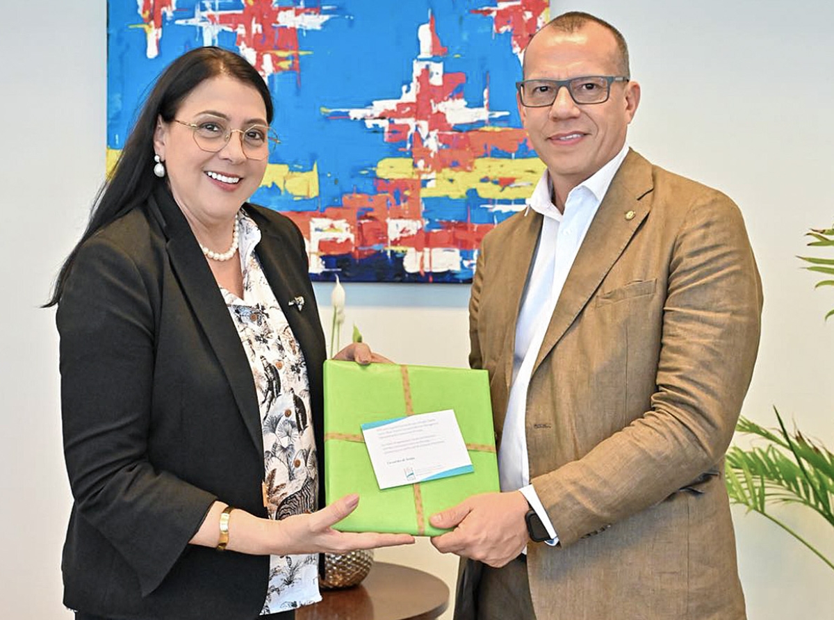 Representante di WHO a bishita Ministro Wyatt-Ras