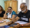 Comite Olimpico Arubano a reuni cu entrenador di natacion Peter Andrews 