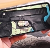 Sospechoso por haya 1 aña di prizon pa djis tin potret di arma di candela den smartphone