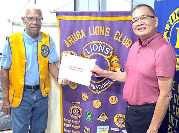 John Fun a duna un presentacion na Aruba Lions Club