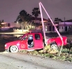 Pickup a ranca palo di luz riba Avenida Nelson Oduber