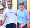 Trabao boluntario ta uni comunidad durante preparacionnan pa Art Week Aruba