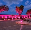 WEB Aruba NV a ilumina nan edificionan y tambe rotonde na color ros