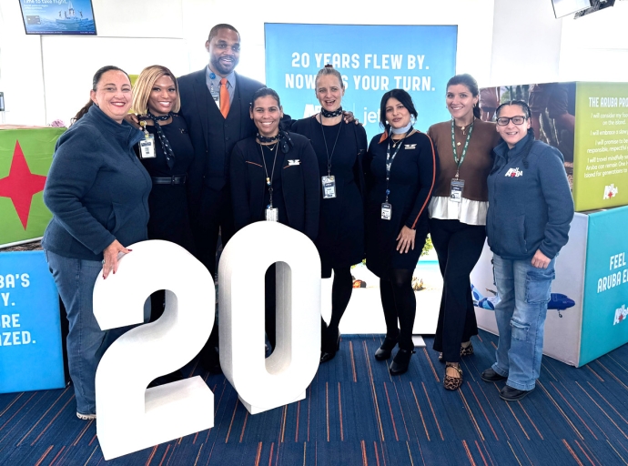Aeropuerto di Aruba ta celebra 20 aña di vuelo directo di jetBlue entre New York y Aruba